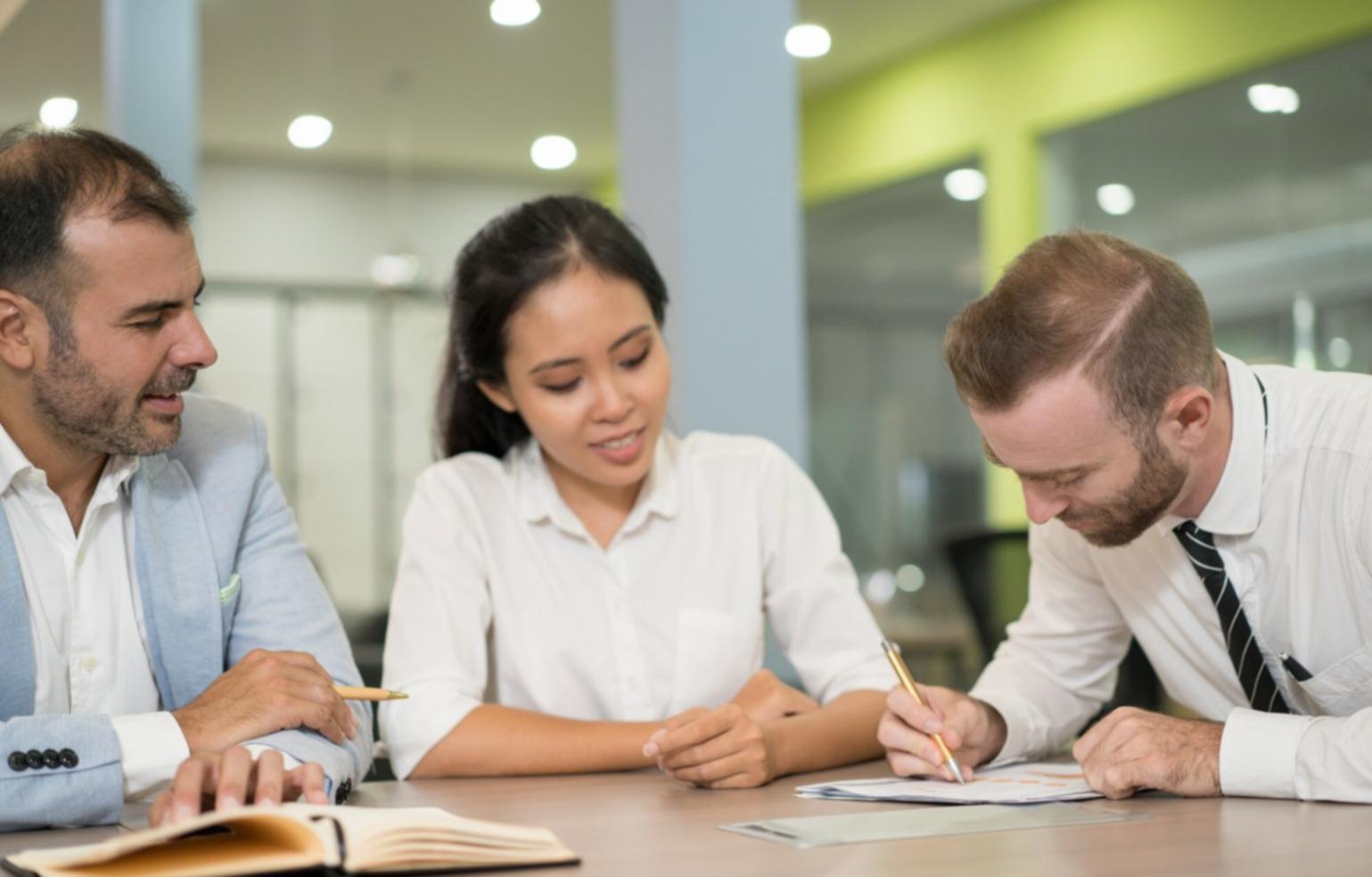 Financial analysis workspace showing charts and business documents